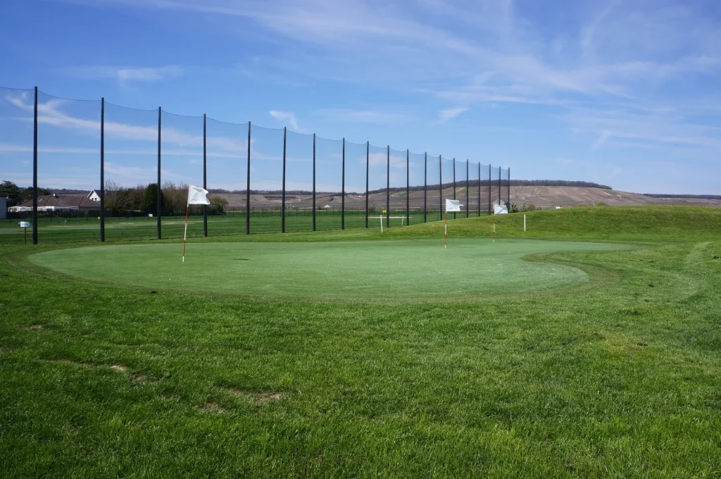 Artificial turf chipping green